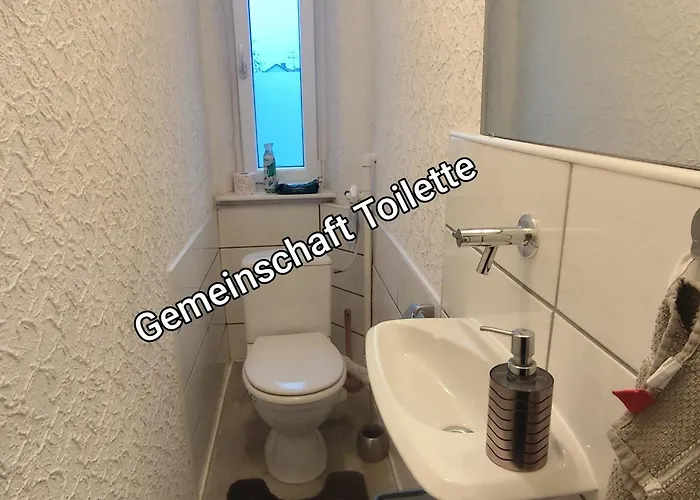 Gaestezimmer Boxenstopp Quarto em Acomodações Particulares *