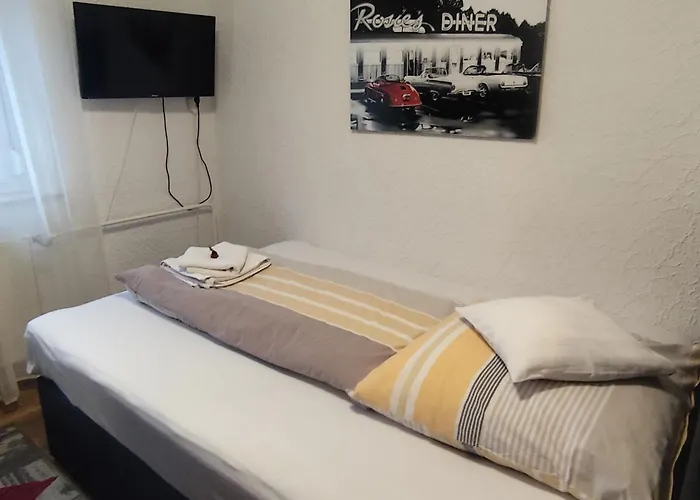 Gaestezimmer Boxenstopp Habitación en casa particular Veitsbronn